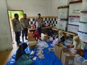Polres Pematangsiantar Lakukan Pengamanan Pelipatan Kertas Surat Suara di Gudang KPU