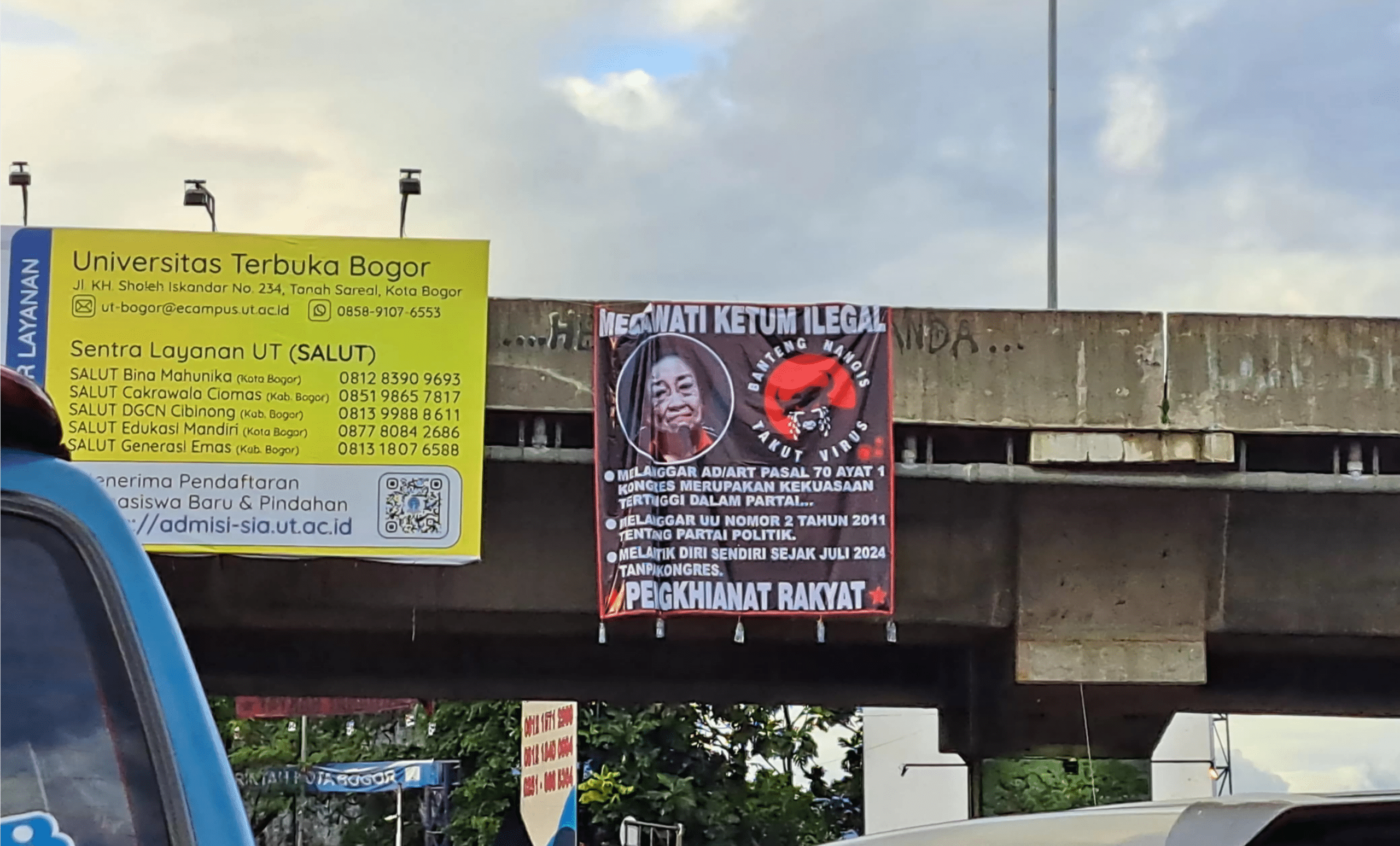 Spanduk berwarna hitam tersebut berada di Lingkar Tol Bogor Outing Ring Road, Kedung Halang, Kota Bogor (KIS/IST)