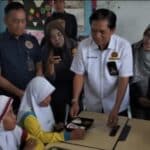 Garda Prabowo Sumsel bagikan MBG ke siswa SDN 180 Palembang. (Ist)